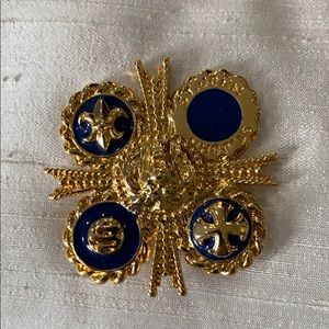 St. John crest pin